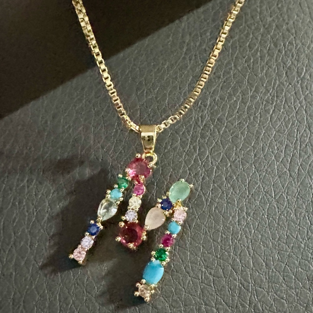 Adornia Gemstone initial M gold plated necklace.